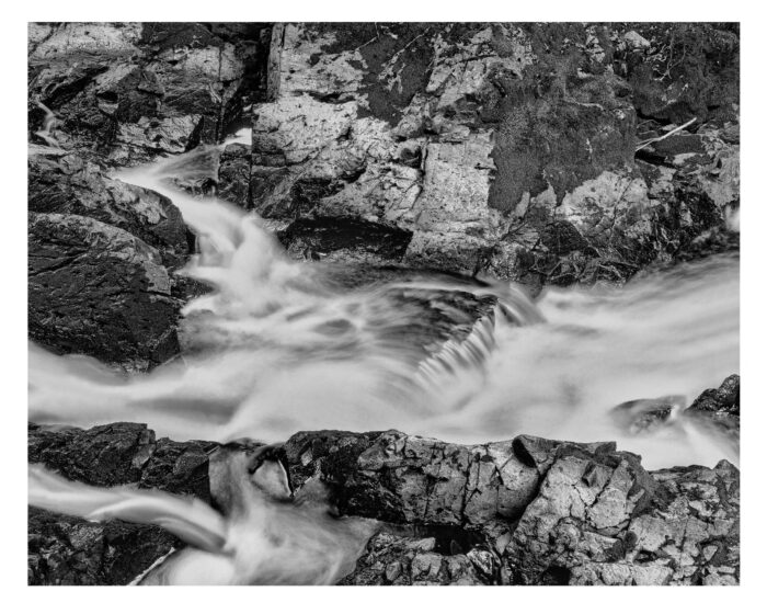 Cisco Falls #7 - B&W Fine Art Print from 4x5 Film "Cisco Falls #7" is offered as a limited edition, fine art black and white photographic print. I captured this subject in 4x5 film with an Ebony 4x5 view camera and 150mm APO Rodenstock Sironar S APO lens @ f32 with a 2 second long exposure in the Upper Peninsula of Michigan.