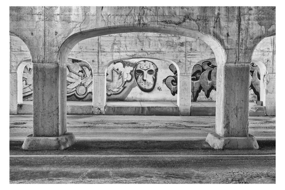 Limited Edition, fine art black and white photographic print, "Chicago Viaduct #36" was shot in Chicago, Illinois under the rails in Pilsen on Peoria Street.