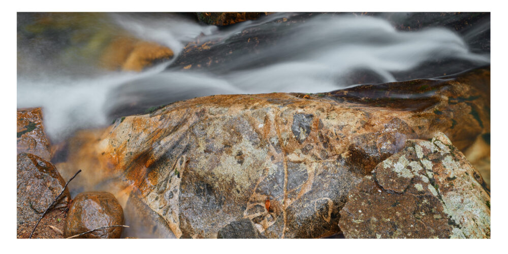 "Pemigewasset River #9", photographed in Franconia Notch State Park, New Hampshire, is offered as a limited edition, fine art color photographic print in panoramic format.